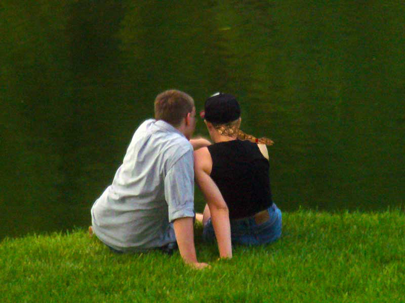 Young couple enjoys time at lake. In MooScience.