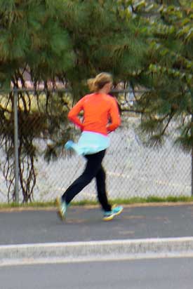 Runner in orange shirt by MooScience.