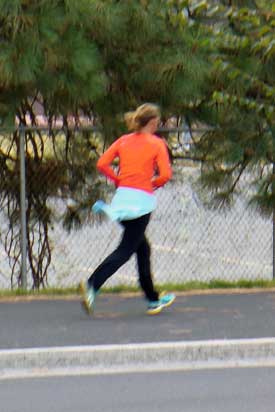 Runner in orange shirt by MooScience.